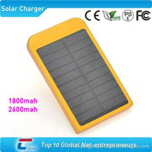 Portable solar powered battery charger with four connector